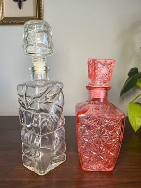 Set of 2 Vintage Glass Square Cut Liquor Decanters & Stoppers. The pink one glow